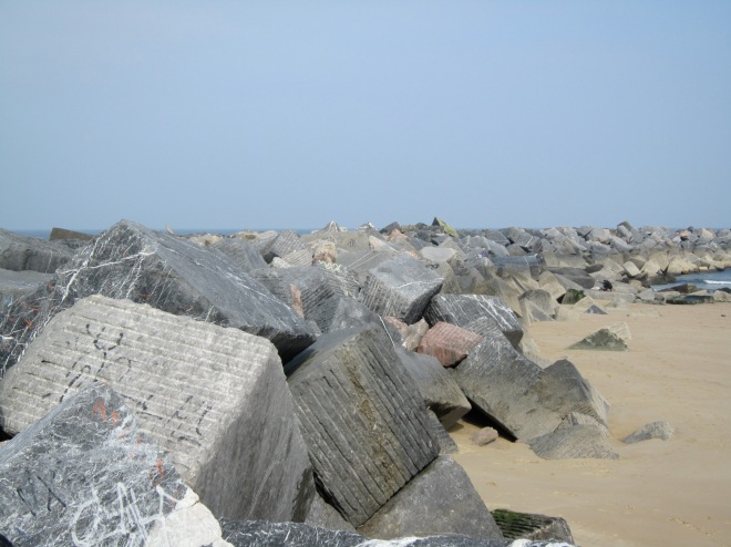 Interested decision to include stone cubes on the beach